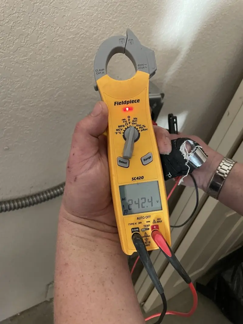 Voltage testing with clamp meter during Hot Tub / Pool Electrical Wiring in Batavia